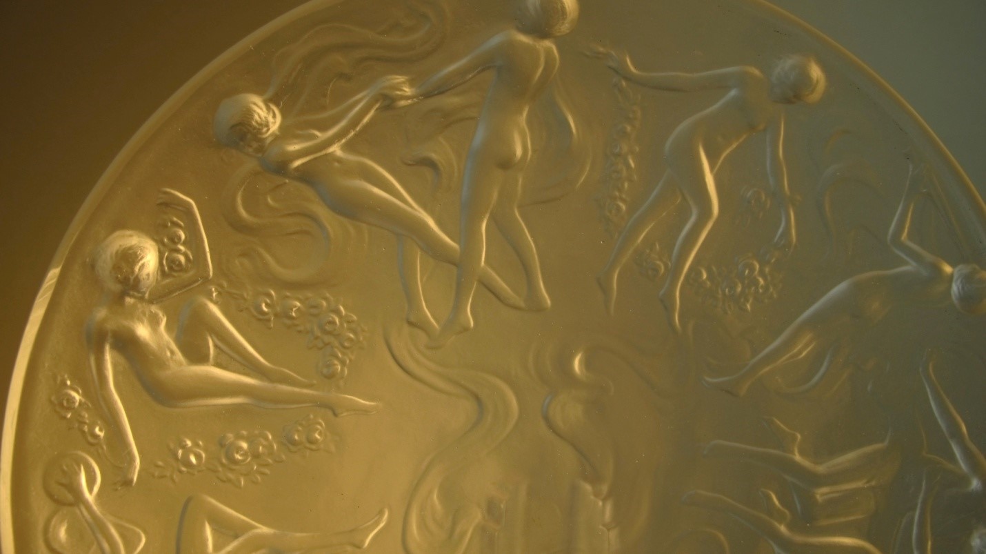 Dancing Nymph Plate (Consolidated) – Close-Up of Reclining Figure (at far left)